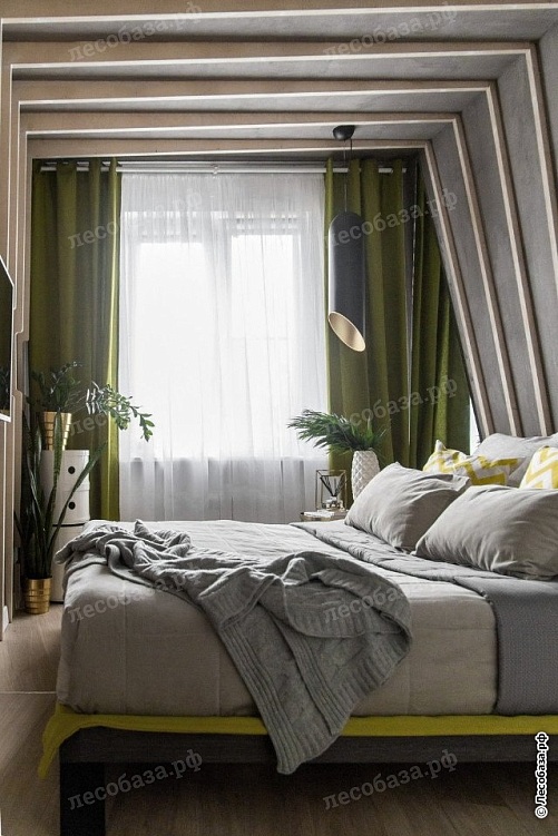 Спальная комната в серых и зеленых тонах