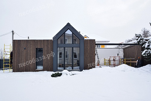 Фото 4. Фасад дома из планкена